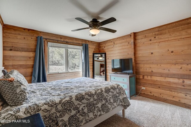 1135 N Rose Quartz Dr, Prescott, AZ 86303 - bedroom with wood walls, carpet flooring, and ceiling fan