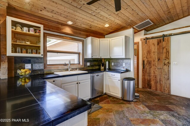 1135 N Rose Quartz Dr, Prescott, AZ 86303 - kitchen featuring dishwasher, a sink, wood ceiling, white cabinetry, and tasteful backsplash