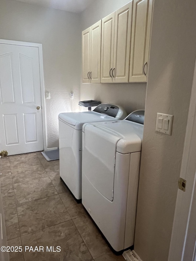 5626 N Ardmore Ave, Prescott Valley, AZ 86315 - washroom featuring separate washer and dryer, tile patterned floors, and cabinet space