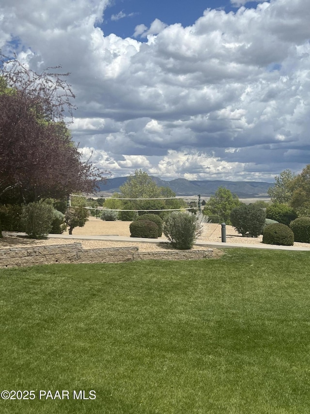 5626 N Ardmore Ave, Prescott Valley, AZ 86315 - view of home's community featuring a lawn and volleyball court