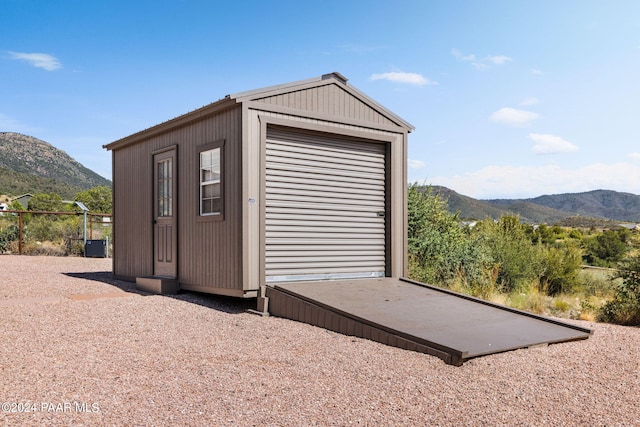 garage featuring a mountain view