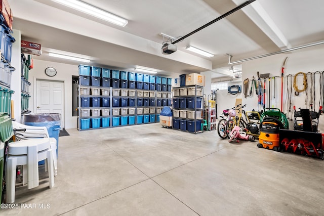 garage featuring a garage door opener