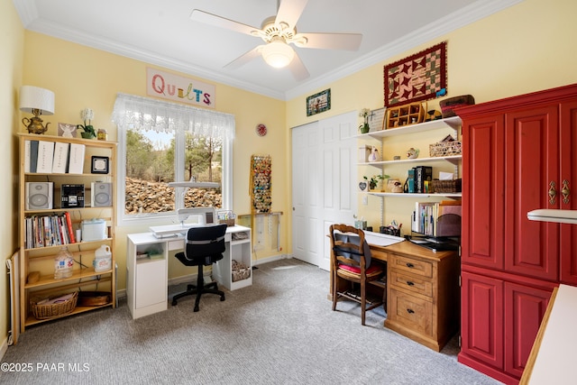 office area featuring baseboards, carpet flooring, ceiling fan, and crown molding
