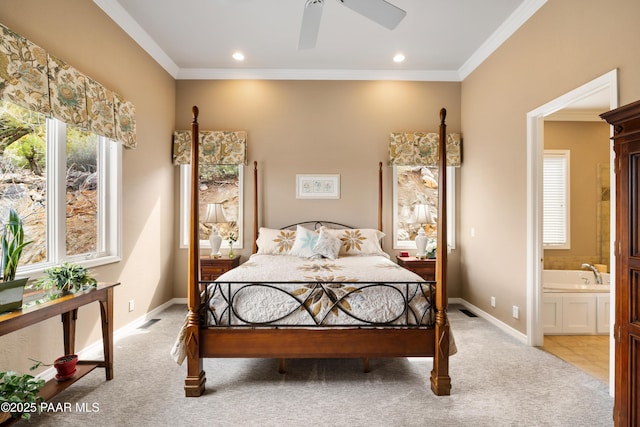 bedroom featuring light carpet, crown molding, and baseboards