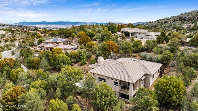drone / aerial view featuring a mountain view