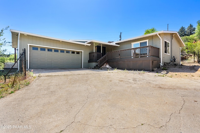902 Fern Dr, Prescott, AZ 86305 - view of front facade featuring driveway and an attached garage