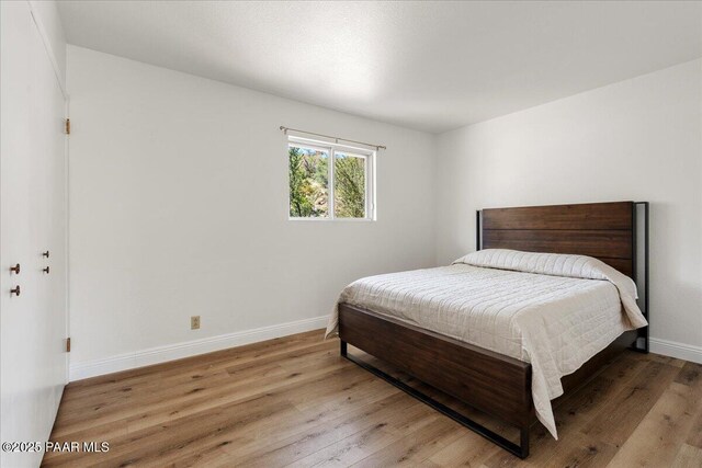 902 Fern Dr, Prescott, AZ 86305 - bedroom with wood finished floors and baseboards