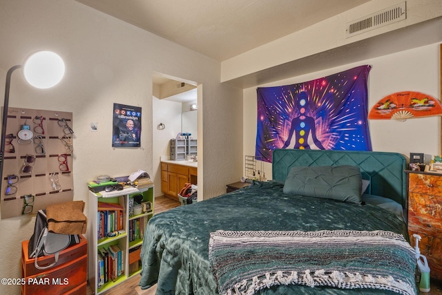 217 Creekside Cir Unit 16G, Prescott, AZ 86303 - bedroom with wood finished floors