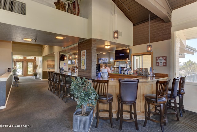10701 E Stirrup High Dr Unit W, Dewey-Humboldt, AZ 86327 - bar featuring plenty of natural light, visible vents, and carpet floors