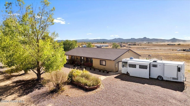 view of front of house with a mountain view