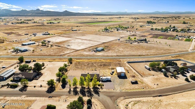 bird's eye view featuring a mountain view and a rural view