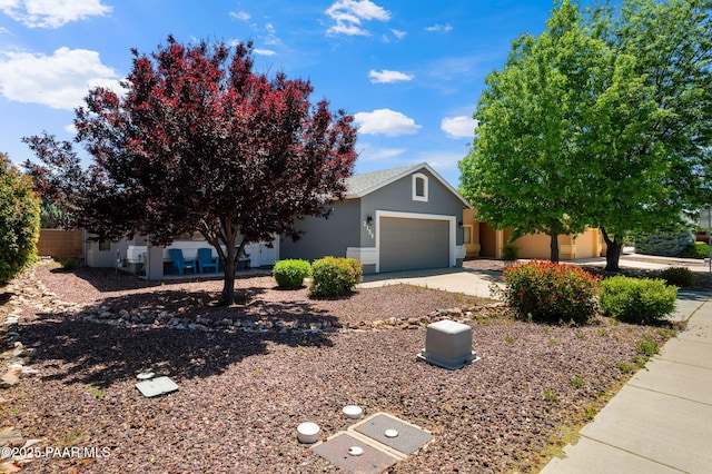 obstructed view of property featuring a garage