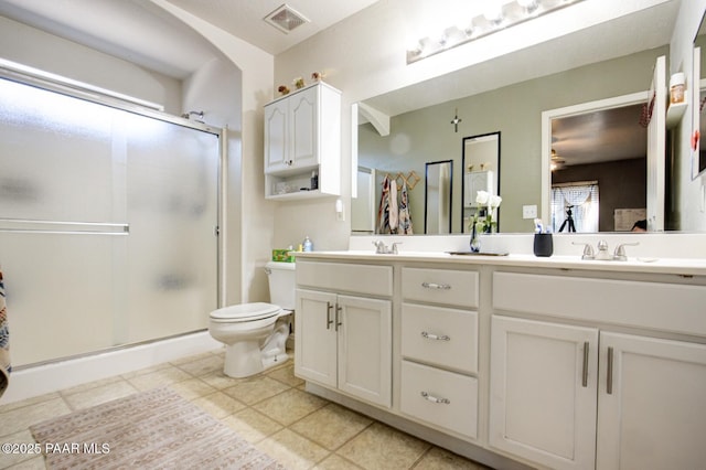 6126 N Little Papoose Dr, Prescott Valley, AZ 86314 - full bathroom with double vanity, a shower stall, and tile patterned floors