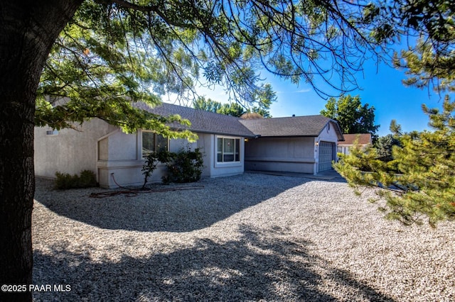 6126 N Little Papoose Dr, Prescott Valley, AZ 86314 - ranch-style house with a garage and stucco siding