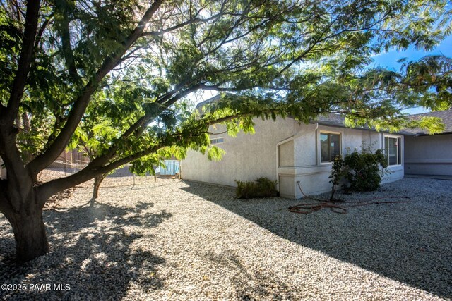 6126 N Little Papoose Dr, Prescott Valley, AZ 86314 - view of home's exterior with stucco siding