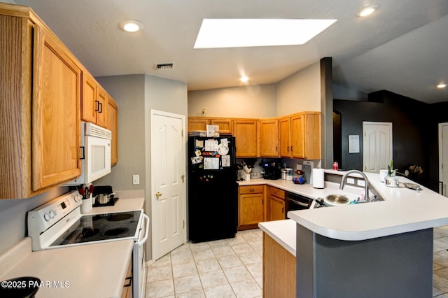 6126 N Little Papoose Dr, Prescott Valley, AZ 86314 - kitchen with white appliances, a peninsula, light countertops, vaulted ceiling, and light tile patterned floors