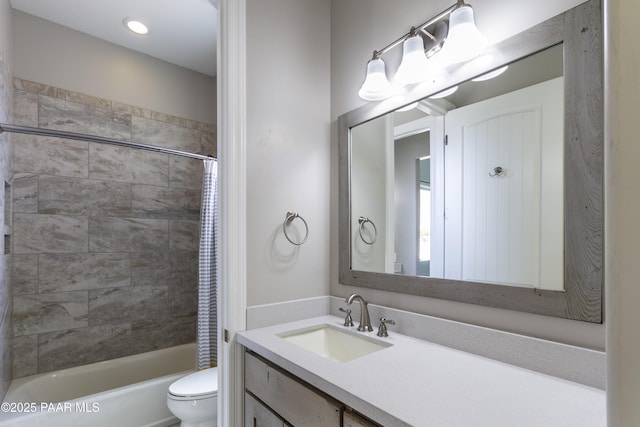 full bath featuring toilet, shower / tub combo, and vanity