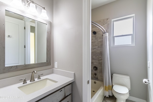 full bathroom featuring vanity, toilet, baseboards, and shower / bath combination with curtain