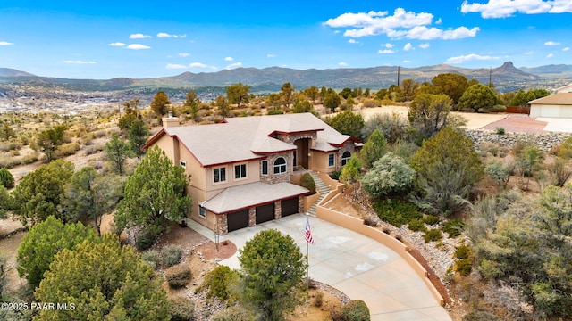 drone / aerial view featuring a mountain view