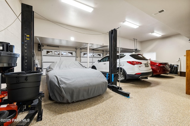 garage featuring visible vents