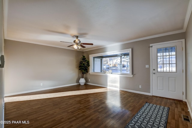 foyer entrance featuring ornamental molding, ceiling fan, and dark hardwood / wood-style flooring