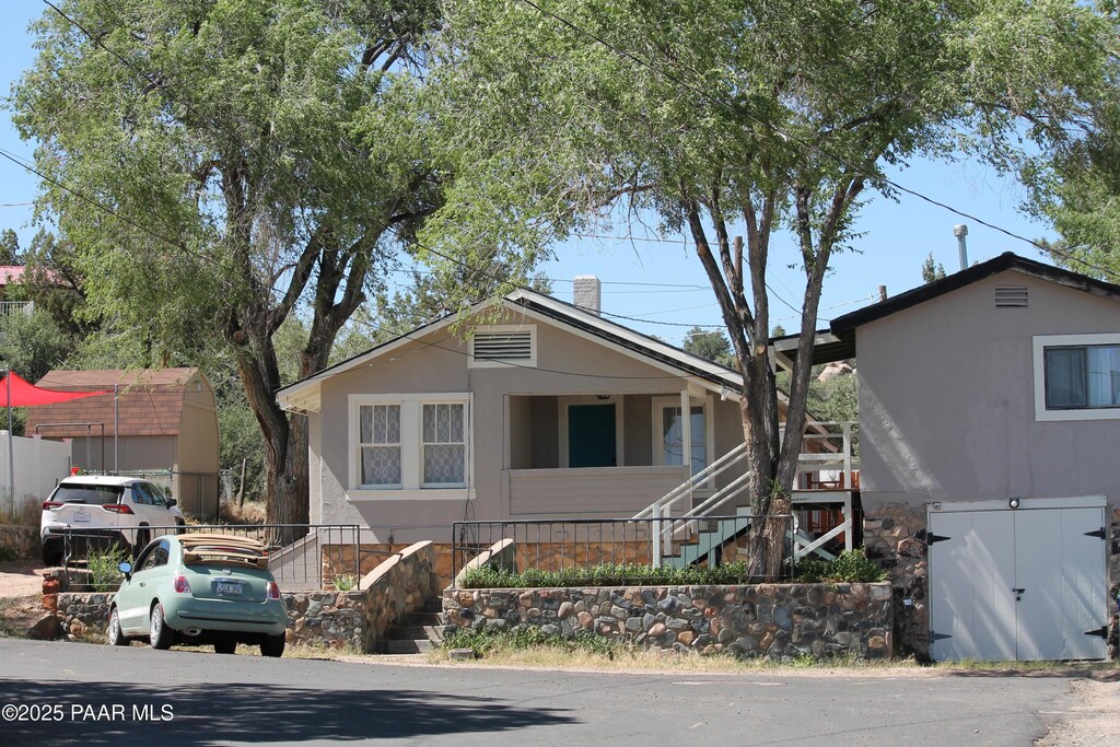 827 5th St Unit A/B, Prescott, AZ 86301 - view of front of house with stairway and a chimney
