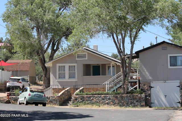 827 5th St Unit A/B, Prescott, AZ 86301 - view of front of house with stairway and a chimney