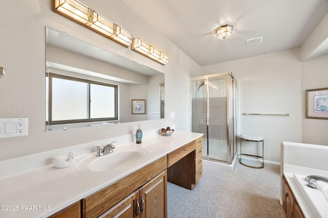 full bath featuring vanity, baseboards, a stall shower, and visible vents