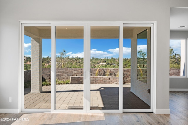 doorway featuring hardwood / wood-style floors