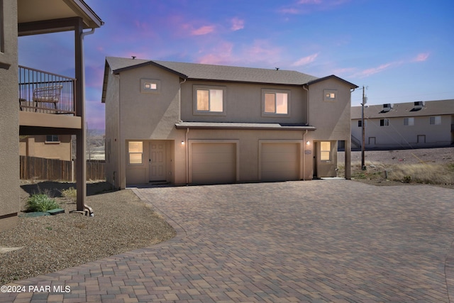 view of front of property featuring a garage