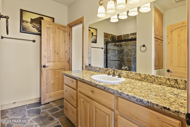 bathroom featuring vanity and walk in shower