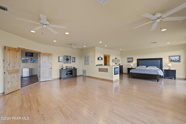 unfurnished living room with light hardwood / wood-style flooring