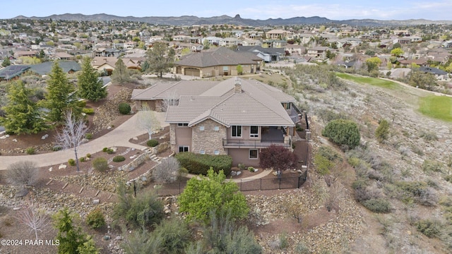 birds eye view of property featuring a mountain view