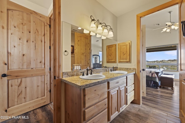 bathroom with vanity, wood-type flooring, and ceiling fan