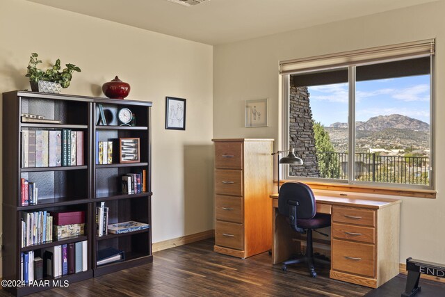 office area featuring dark hardwood / wood-style flooring and a mountain view