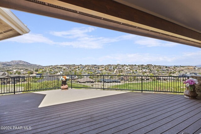 wooden terrace with a mountain view