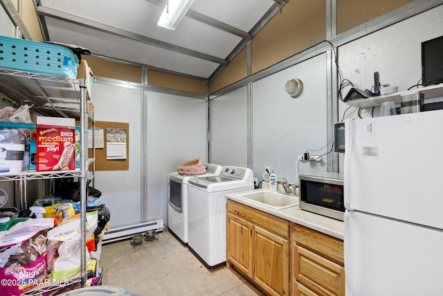 13225 N Bull Run Rd, Prescott, AZ 86305 - laundry room with a baseboard heating unit and washer and clothes dryer