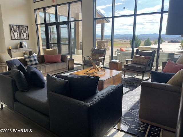 living room with plenty of natural light and a mountain view