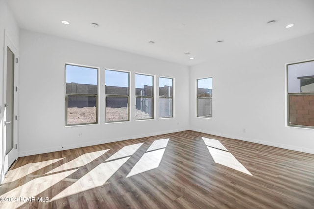 spare room with light wood-type flooring