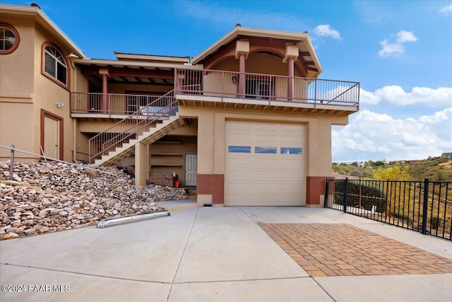 view of front of property with a garage