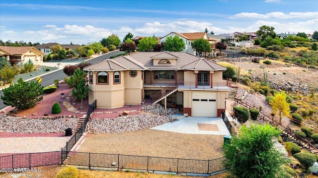 view of front of property with a garage