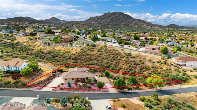 drone / aerial view featuring a mountain view