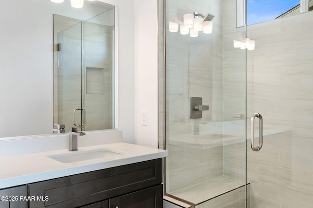 bathroom featuring vanity and walk in shower