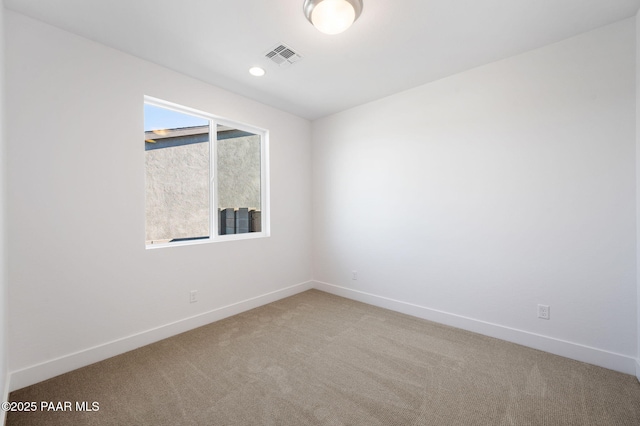 empty room featuring carpet