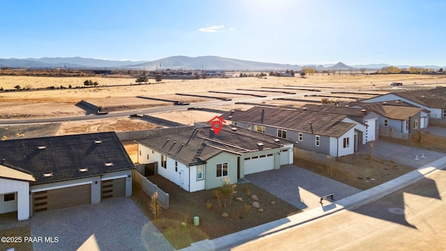 bird's eye view featuring a mountain view and a rural view