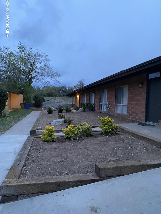 view of front of home with brick siding