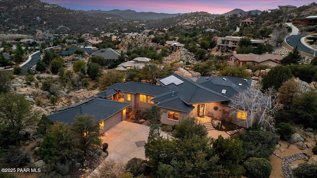 view of aerial view at dusk