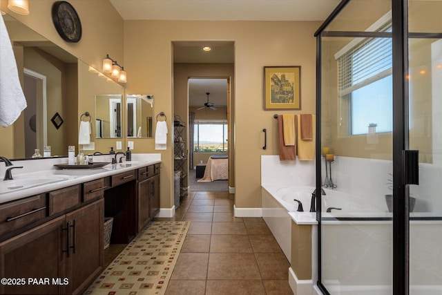 5245 Wellness Way, Prescott, AZ 86301 - full bathroom featuring ceiling fan, a bath, ensuite bathroom, baseboards, and tile patterned flooring