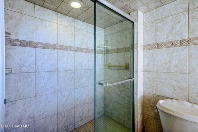 10412 E Prescott Dells Ranch Rd, Dewey-Humboldt, AZ 86327 - bathroom featuring a shower stall and tile walls