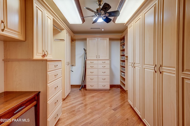 10412 E Prescott Dells Ranch Rd, Dewey-Humboldt, AZ 86327 - walk in closet with a ceiling fan and light wood-style flooring